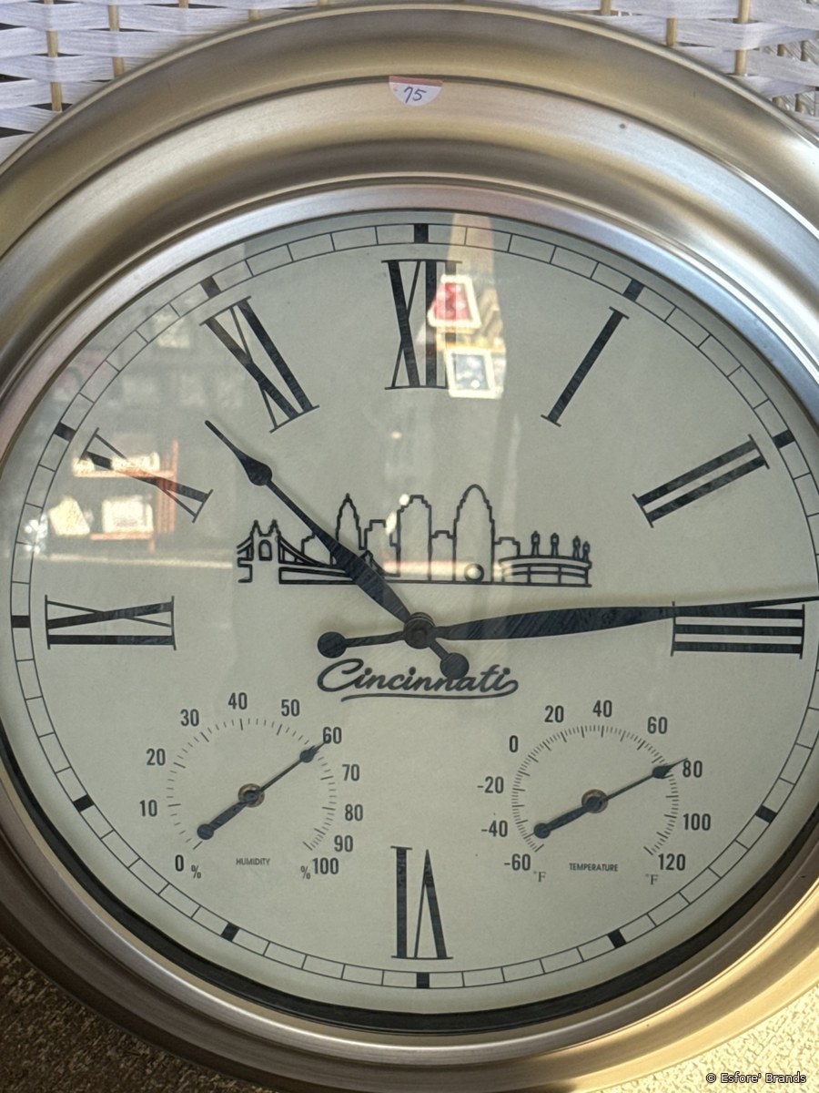 The Cincinnati Skyline clock up close — skyline, bridge and stadium in hand-cut wood