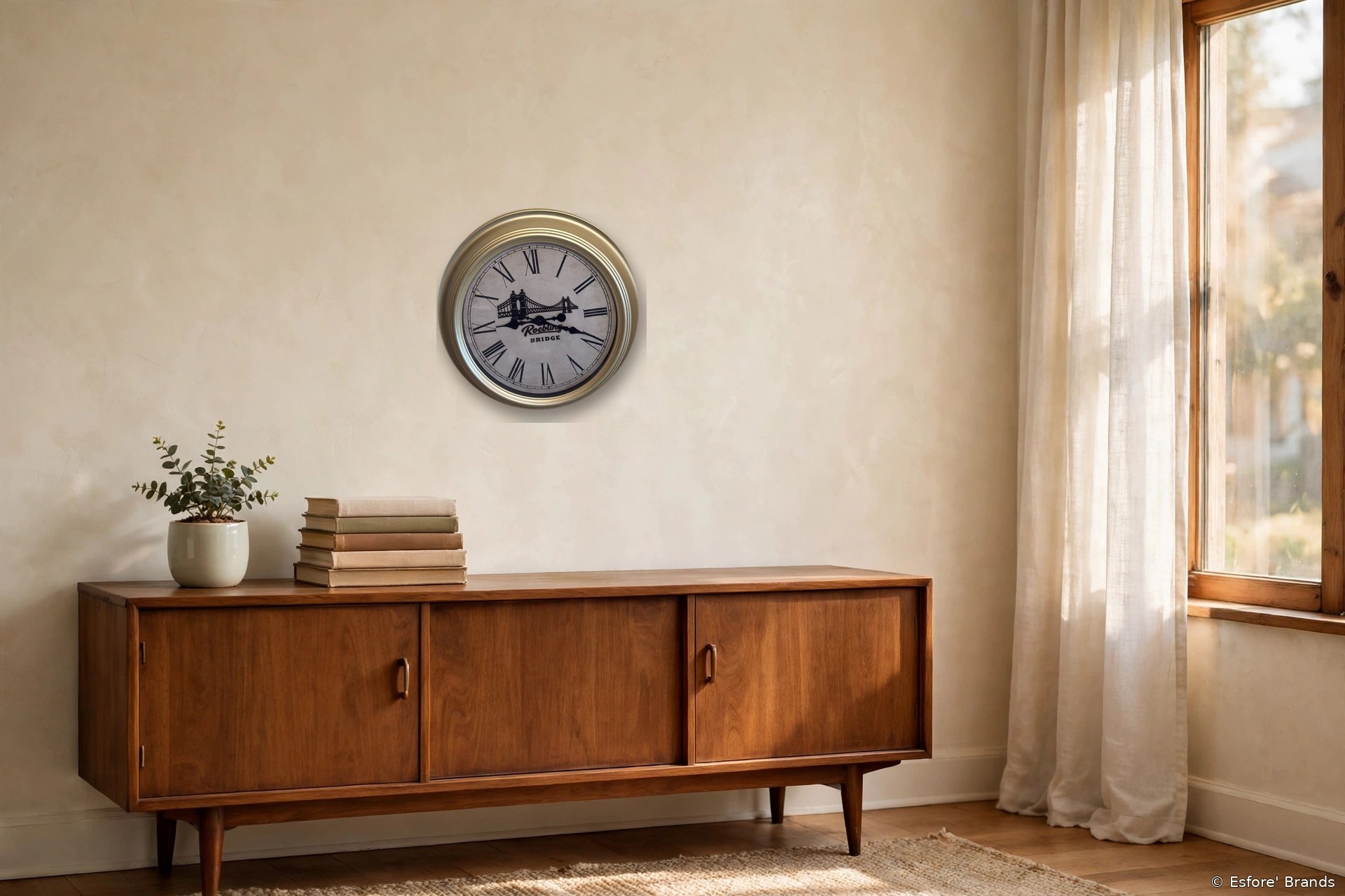 Roebling Bridge upcycled wall clock with a wooden bridge silhouette on the face, hanging in a living room