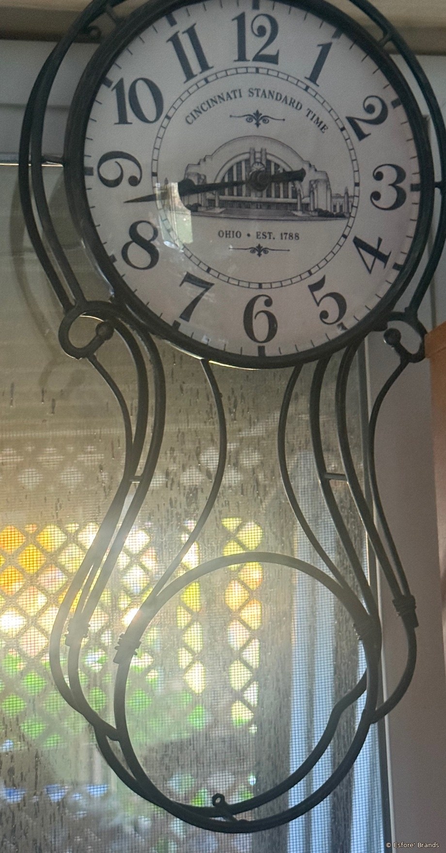 Cincinnati Standard Time upcycled wall clock with Union Terminal on the face, in a black metal frame