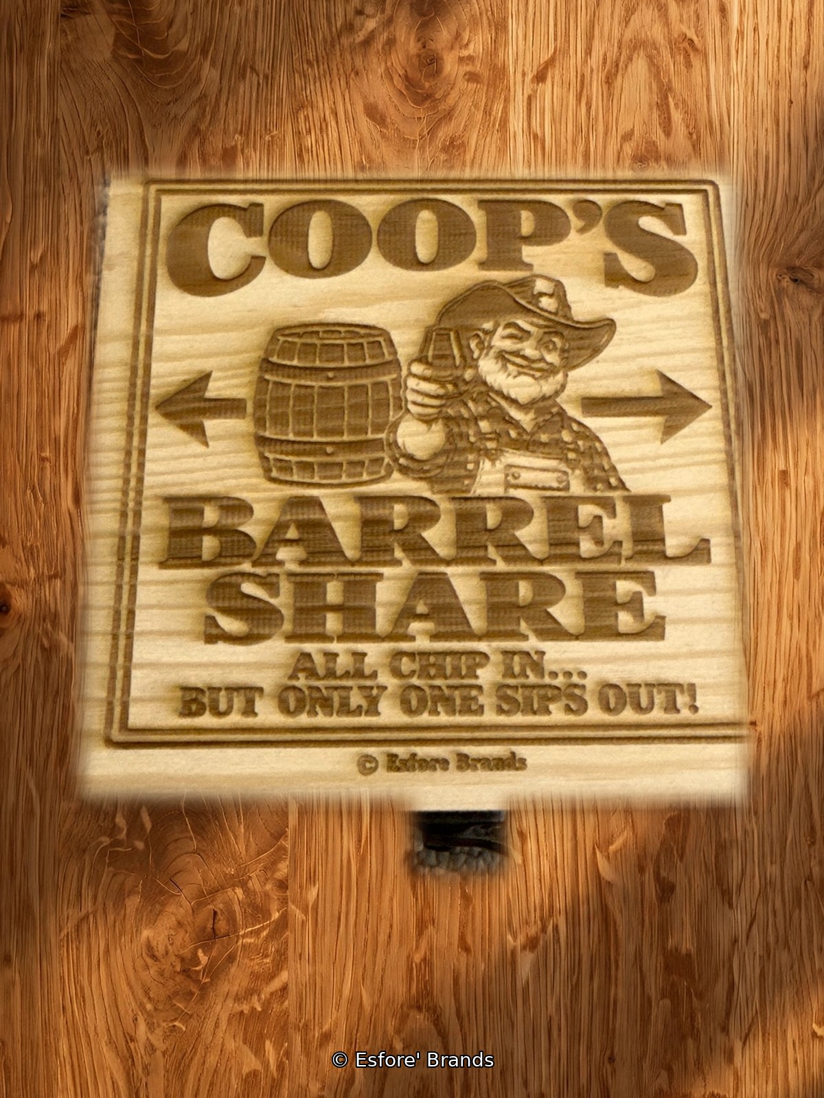 Coop's Barrel Share bourbon dice game in a laser-engraved wooden box, on a bar top