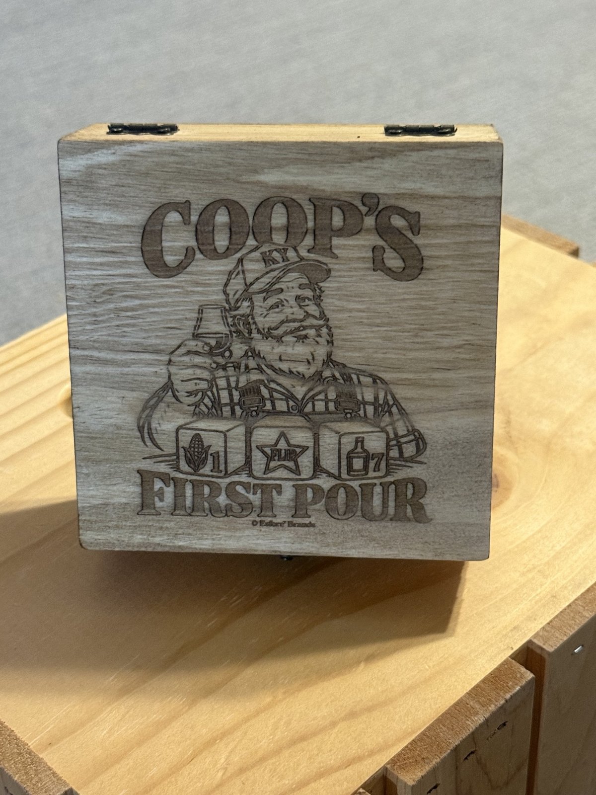 Coop's First Pour bourbon dice game in a laser-engraved wooden box