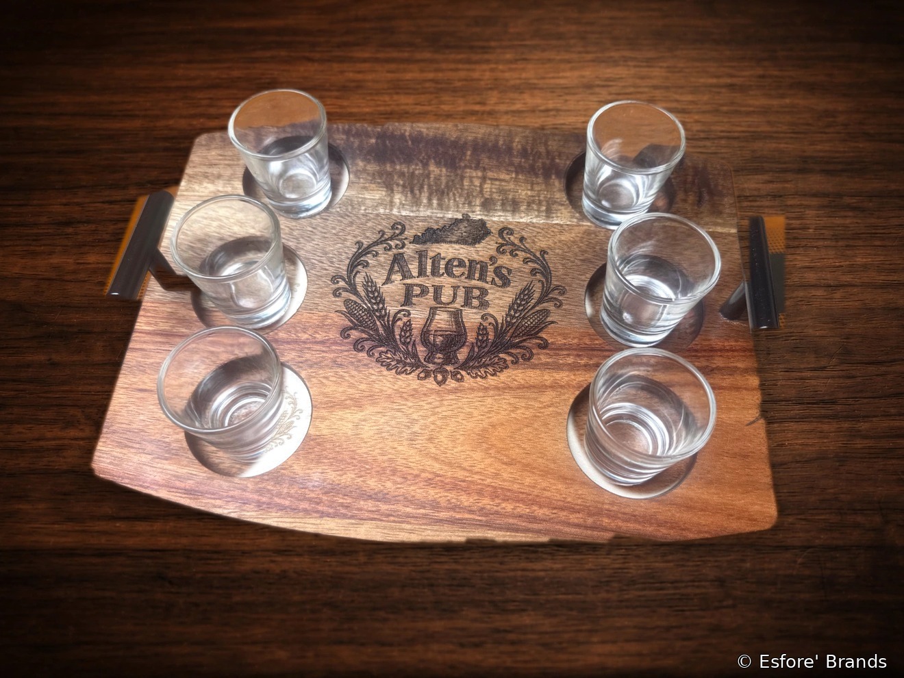 Custom six-glass bourbon flight board in acacia wood with shot glasses and the Alten's PUB center engraving