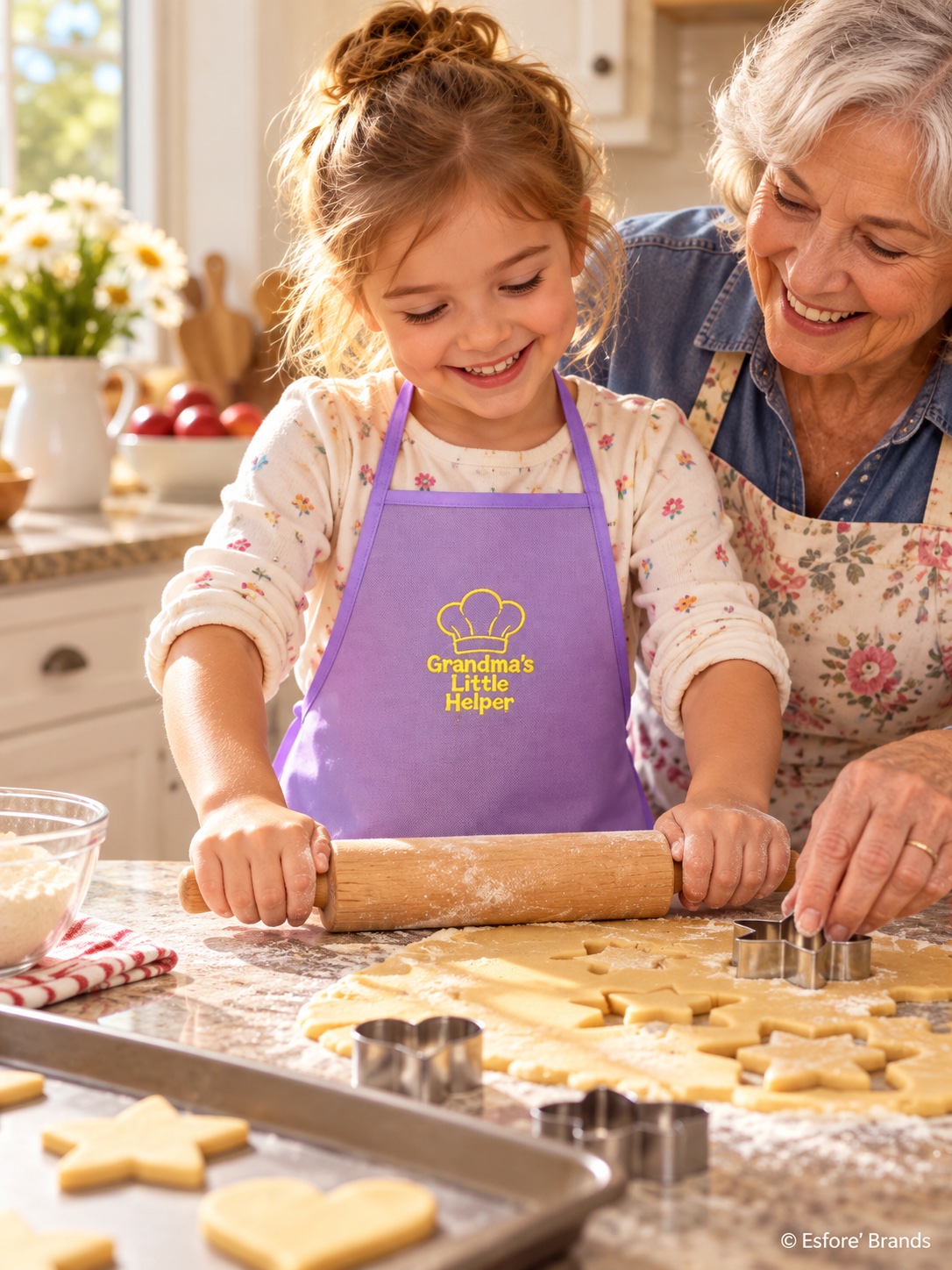 Child wearing the Granny B's Helper apron baking with grandma
