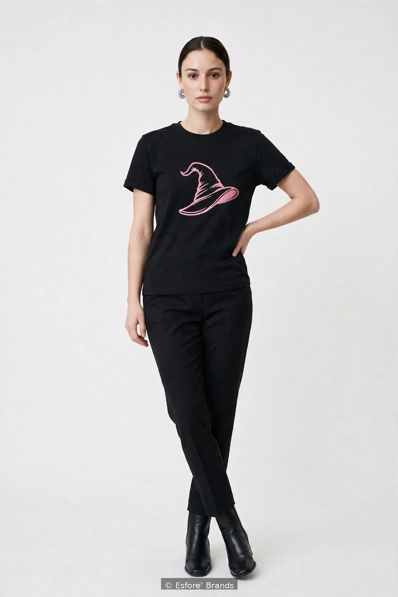 Model wearing the Pink Witch Hat embroidered T-shirt